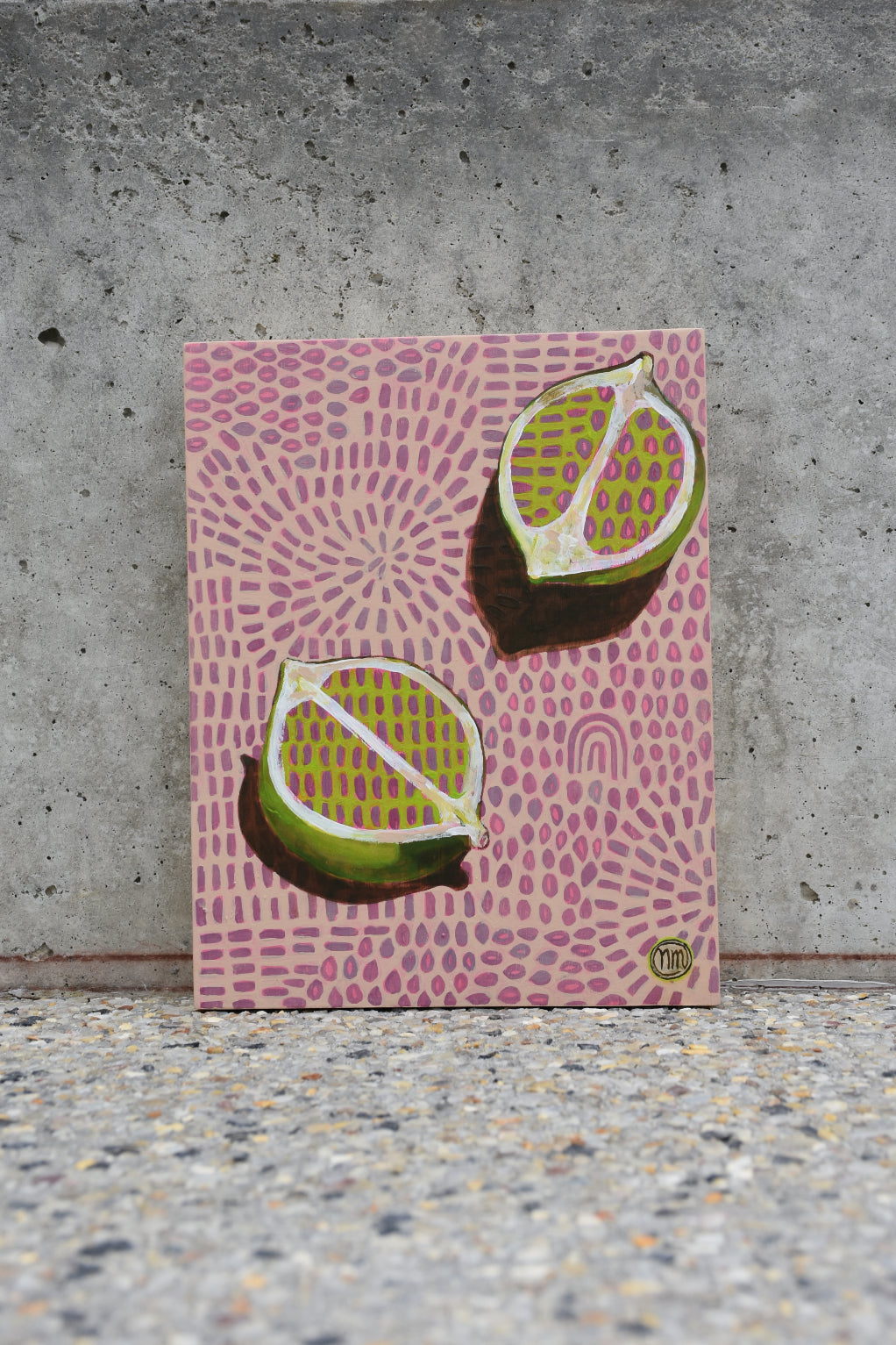 Two halves of a lime on a patterned background. An original painting by West Australian artist Natasha Mott.