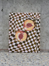 Load image into Gallery viewer, Two halves of a peach on a green and white checked table cloth. An original painting by West Australian artist Natasha Mott.

